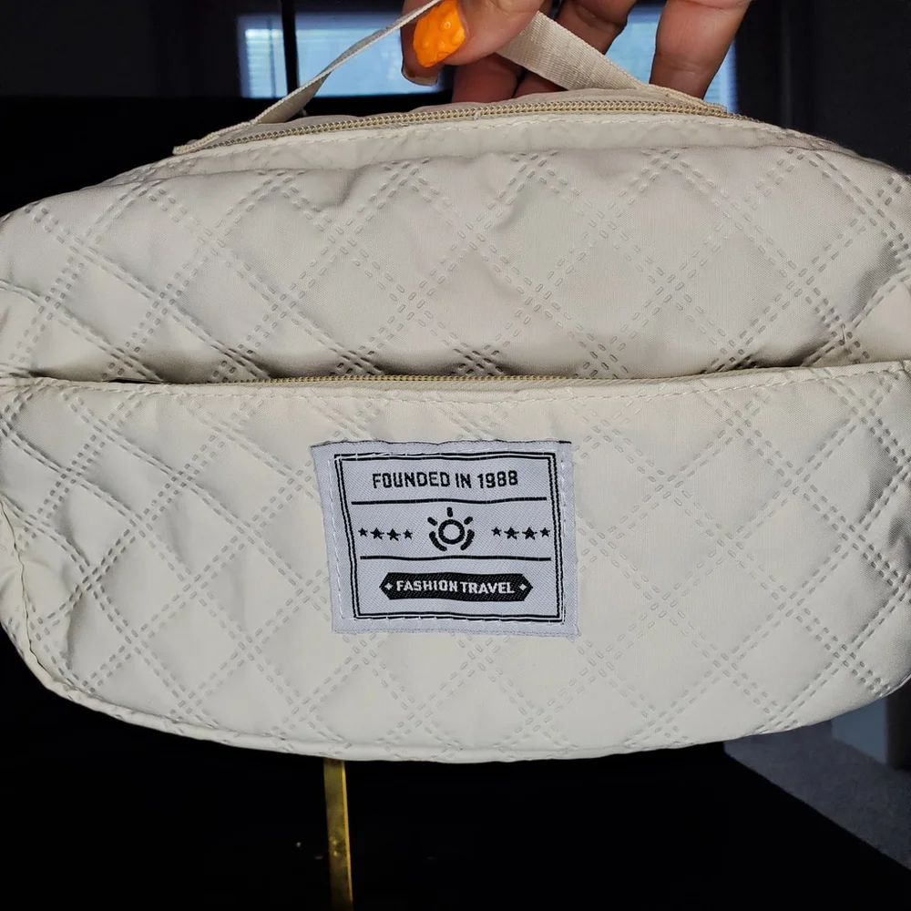 Nice Makeup bag with strap. Good for those spontaneous overnighter!